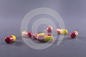 Drug prescription for treatment medication. Pharmaceutical medicament, cure in container for health. Pharmacy theme.Heap of red