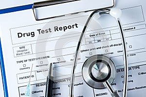 Drug test report, Medical stethoscope with clipboard