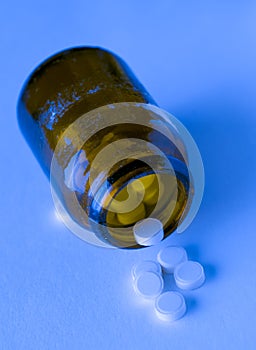 Drugs in a glass bottle