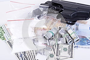 Drugs,money,cocaine and gun