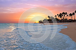 Druif beach at sunset on Aruba island in the Caribbean sea photo