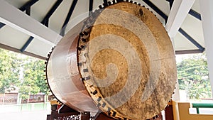 drum closeup photo. The drum is a percussion instrument commonly used by Muslims