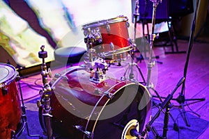 drum kit. set of drums, cymbals and other percussion instruments on stage