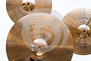 Drum plate, drum set on a white background, musical cymbals top view