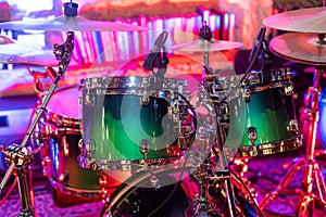 Drum set with drumstick on before performance