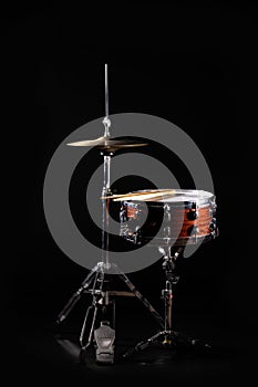 Drum Set On A Stage At Dark Background. Musical Drums Kit On Stage. Vintage look with smoke effect