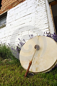 Drum in shamanism on a meadow