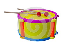 Drum with sticks children's musical instrument isolated on a white background.