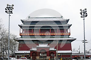drum tower in beijing city in snowing