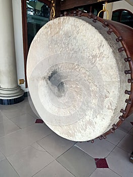 The drum is used in the mosque before the call to prayer and a layer of cowhide is used