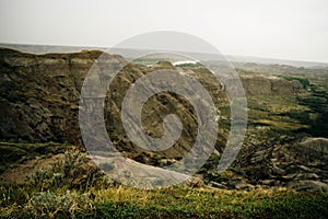 Drumheller badlands landscape in summer, Dinosaur Provincial Park, Alberta, Canada.