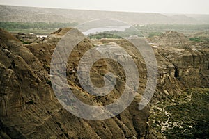 Drumheller badlands landscape in summer, Dinosaur Provincial Park, Alberta, Canada.