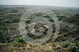 Drumheller badlands landscape in summer, Dinosaur Provincial Park, Alberta, Canada.