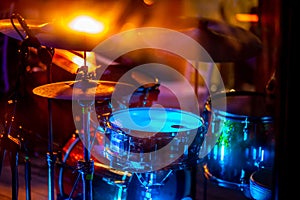 Drumkit in abstract multicolored light photo