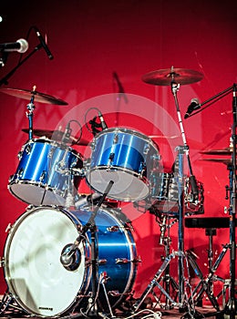 Drumkit in front of Blue Background photo