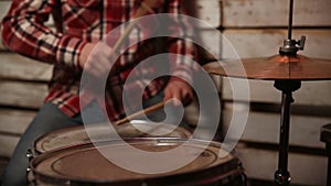 Drummer performing on his drum set.