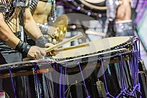 A Drummer is Performing on the Stage. A Musician is Drumming on the Drum Performance. Closeup View Of Man`s Hands, Drums and