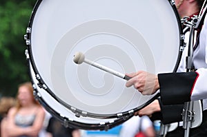 Drummer Playing Bass Drum in Parade photo