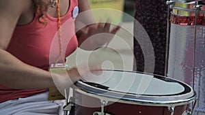 Drummer playing bongo drums