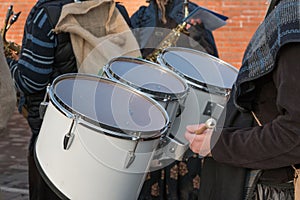 Drummer Playing Snare Drums in Band in Outdoor Event