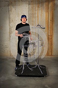 Drummer Playing on Wire Drums