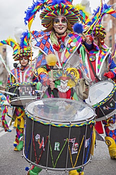 Drummer woman playing at Carnival parade of Badajoz, Spain