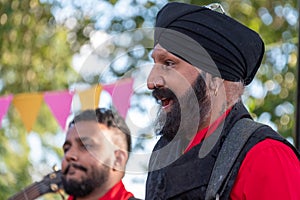 Drummers from the Dhol Foundation playing at an annual concert of Jewish Klezmer music in Regent`s Park in London UK.