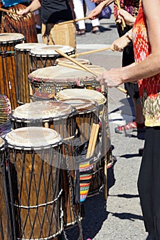 Drummers playing at a Saturday market Penticton, British Columbia, Canada. photo