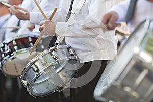 Drummers playing snare drums in parade