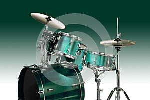 Green Drum kit with cymbals over a green gradient photo