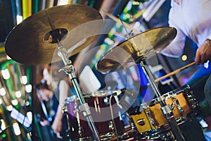 Drums conceptual image. Picture of drums and drumsticks lying on snare drum. Retro vintage instagram picture. photo