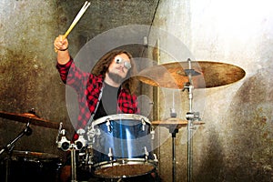 Drums conceptual image. Rock drummer and his drum set.