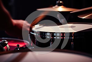 Drums plate close-up, slow-motion capture. Captivating percussions. Music entertainment photo