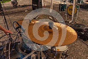 Drums on stage in Chrudim town on punk festival with cymbals and stands