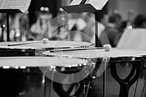 Drumsticks lying on timpani