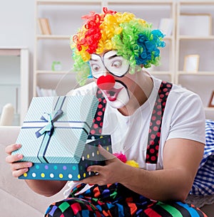 Drunk clown celebrating having a party at home