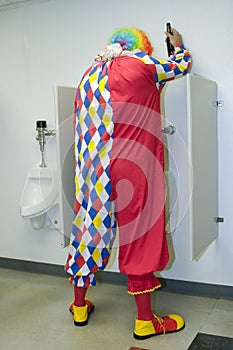 Drunk Clown in Urinal photo