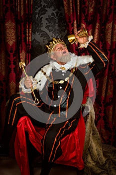 Drunk king with scepter