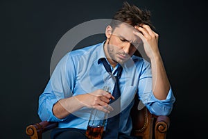 Drunk man drinking alcohol