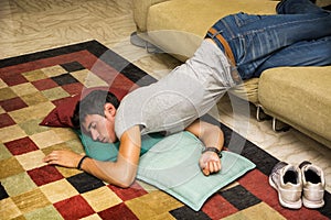 Drunk Man Resting on Couch with head on the Floor