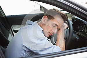 Drunk man slumped on steering wheel