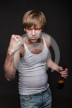 Drunk man threaten with fist photo