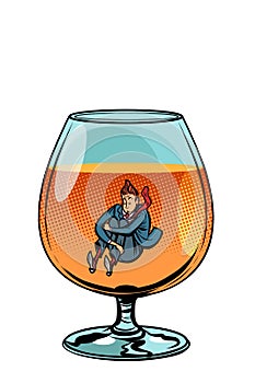 Drunkard in brandy glass