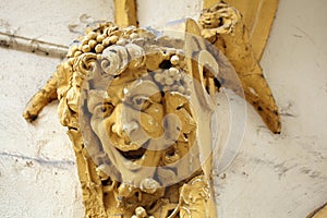 Drunken Bacchus. Stucco mascaron on the Art Nouveau building photo