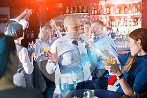 Drunken man having fun at party photo