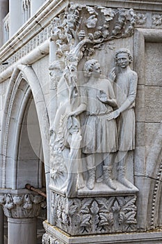 Drunkenness of Noah - architectural detail of column at Doge's Palace, Venice, Italy photo