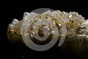 Druse of crystals on black background
