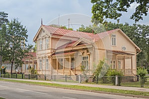 Druskininkai, Lithuania - May 10, 2019: Beautiful wooden house, old wooden villa with carving decorative elements in