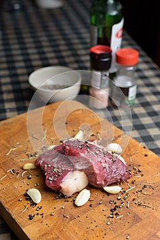 Dry aged raw beef steak with herbs and ingredient