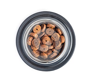 Dry animal food. Dog or cat kibble in bowl isolated on white background